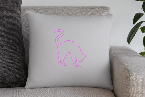 cojín decorativo gris con silueta de gato fucsia , ideal para salón moderno