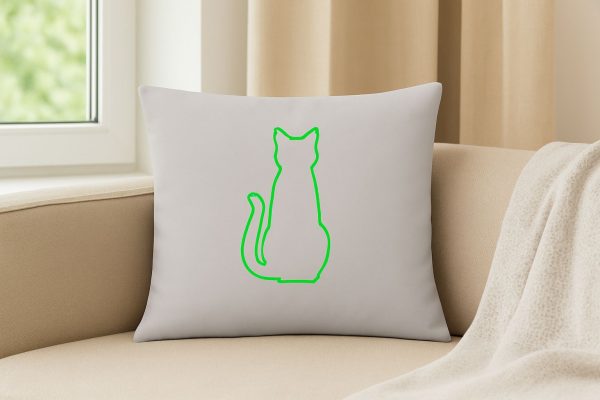 Cojín decorativo gris claro con dibujo minimalista de un gato línea verde.